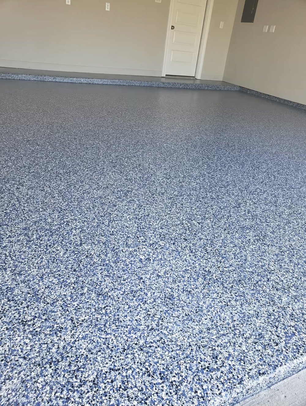 Speckled blue and grey epoxy garage floor coating in Las Vegas, NV