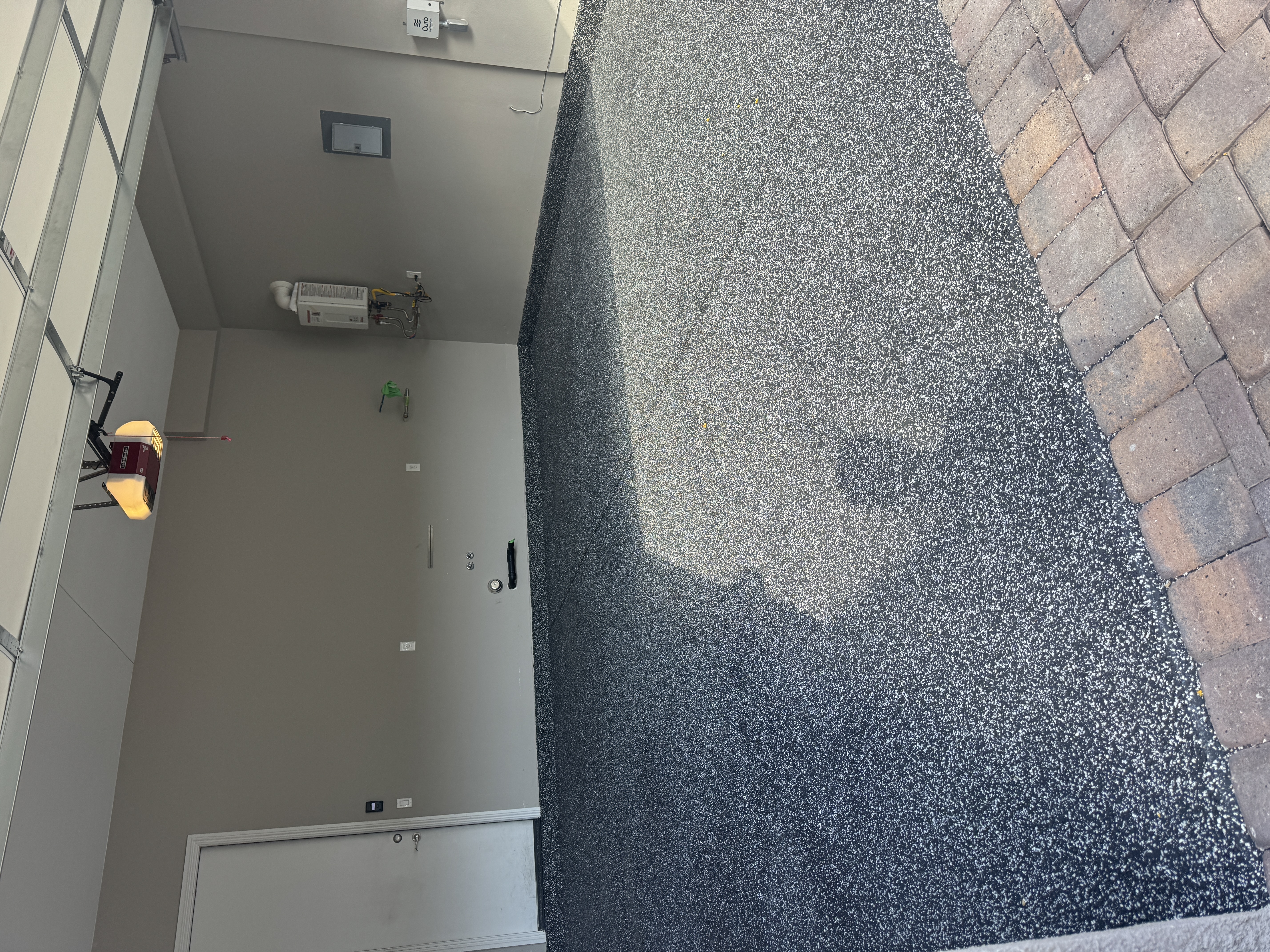 Finished speckled flake epoxy garage floor after Prime X Shield coating in Las Vegas, NV